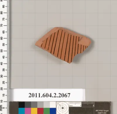 Terracotta fragment of a pot; glazed on the inside