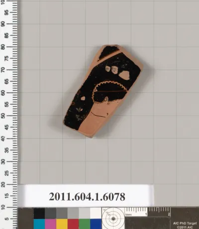 Terracotta fragment of a kylix (drinking cup)