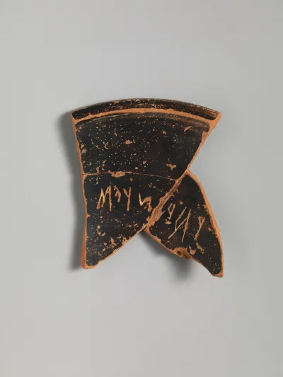 Terracotta bowl fragments with graffito inscription