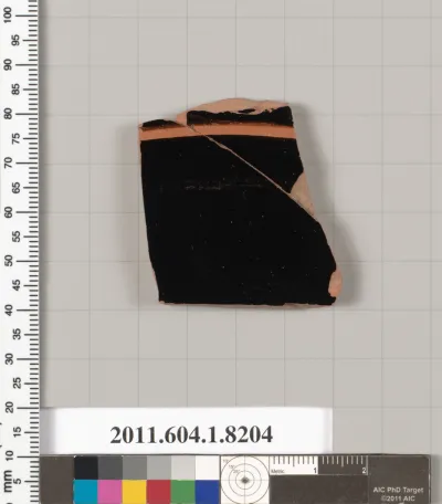 Terracotta fragment of a kylix (drinking cup)