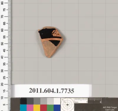Terracotta fragment of a kylix (drinking cup)