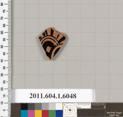 Terracotta fragment of a kylix (drinking cup)