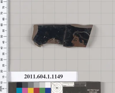 Terracotta rim fragment of a kylix (drinking cup)