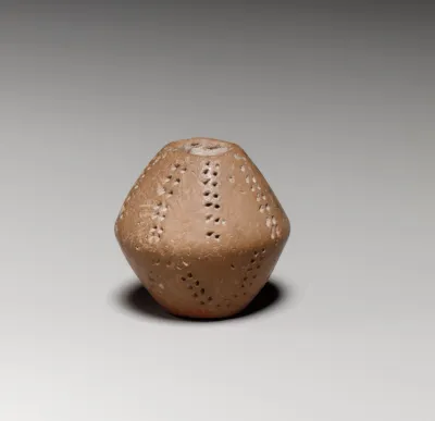 Small terracotta biconical spindle-whorl