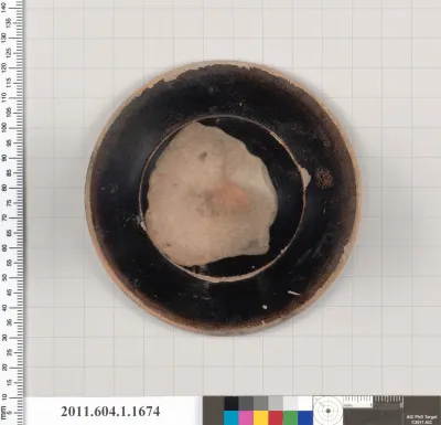 Terracotta fragment of a kylix (drinking cup)