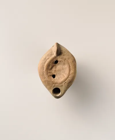 Terracotta oil lamp