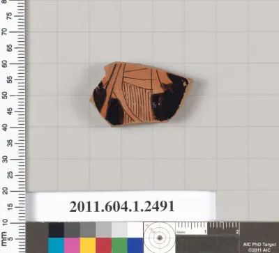 Terracotta fragment of a kylix (drinking cup)