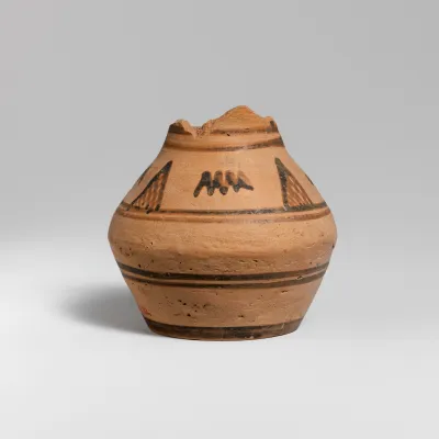 Fragmentary terracotta oinochoe (jug)
