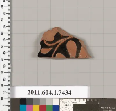 Terracotta fragment of a kylix (drinking cup)