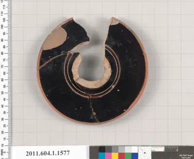 Terracotta fragment of a kylix (drinking cup)
