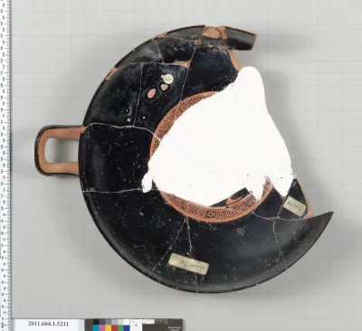 Terracotta fragment of a kylix (drinking cup)