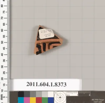 Terracotta fragment of a kylix (drinking cup)