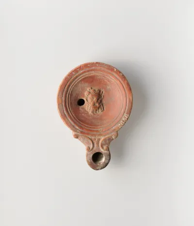 Terracotta oil lamp