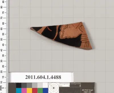 Terracotta fragment of a kylix (drinking cup)
