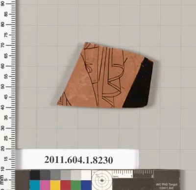 Terracotta fragment of a kylix (drinking cup)