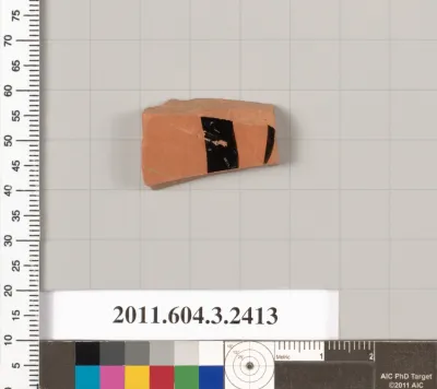 Terracotta fragment of a kylix: eye-cup (drinking cup)