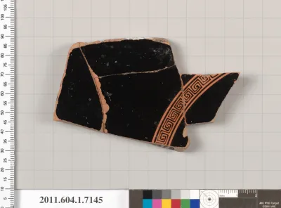 Terracotta fragment of a kylix (drinking cup)