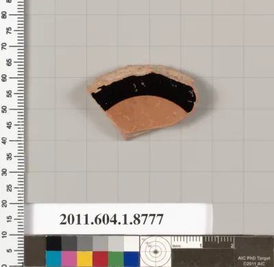 Terracotta fragment of a stemless kylix (drinking cup)?