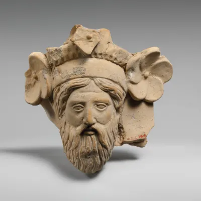 Terracotta head of a man, possibly Dionysos