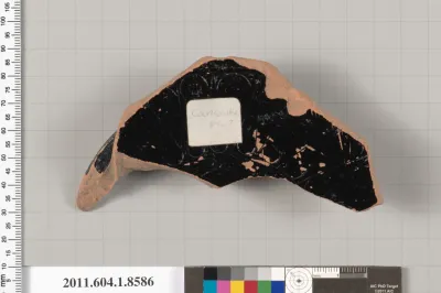 Terracotta fragment of a stemless kylix (drinking cup)