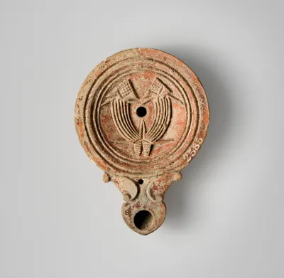 Terracotta oil lamp