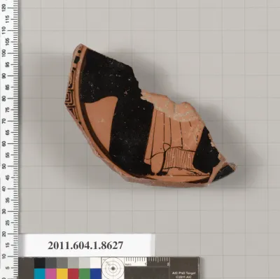 Terracotta fragment of a stemless kylix (drinking cup)