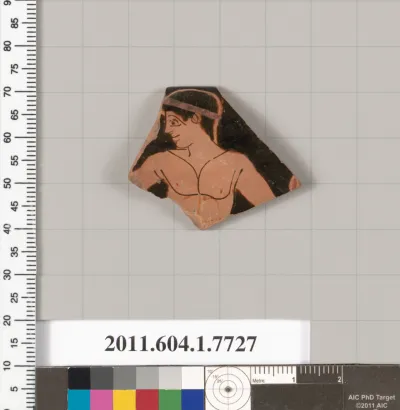 Terracotta rim fragment of a kylix (drinking cup)