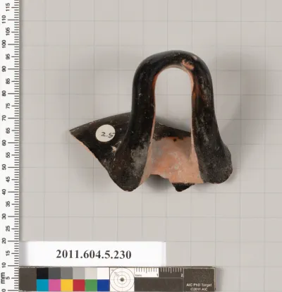 Terracotta rim fragment of a kylix (drinking cup)