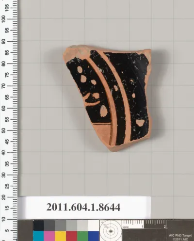 Terracotta fragment of a stemless kylix (drinking cup)