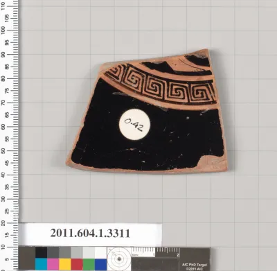 Terracotta fragment of a kylix (drinking cup)