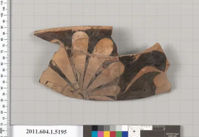 Terracotta fragment of a kylix (drinking cup)
