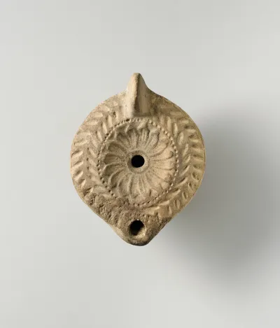 Terracotta oil lamp