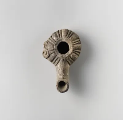 Terracotta oil lamp
