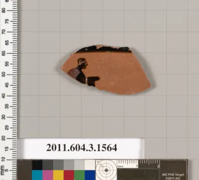 Terracotta fragment of a kylix: Band cup (drinking cup)