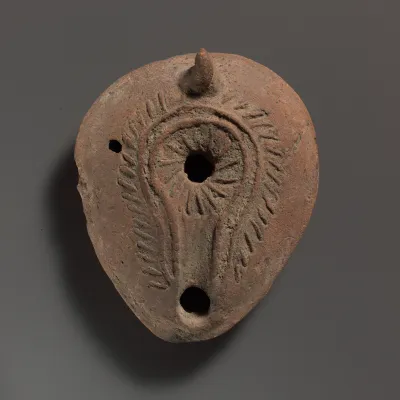 Terracotta oil lamp