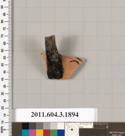 Terracotta fragment of a kylix (drinking cup) or a skyphos (deep drinking cup)?