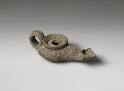 Terracotta oil lamp