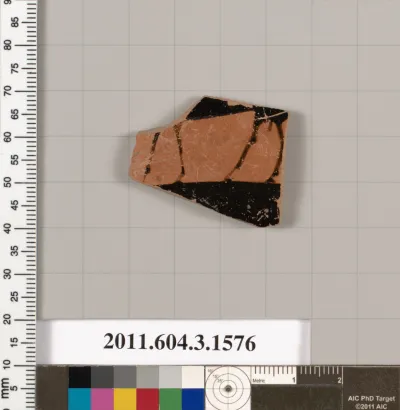 Terracotta fragment of a kylix: Band cup (drinking cup)