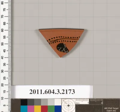 Terracotta rim fragment of a kylix (drinking cup)