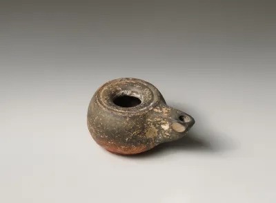 Terracotta oil lamp