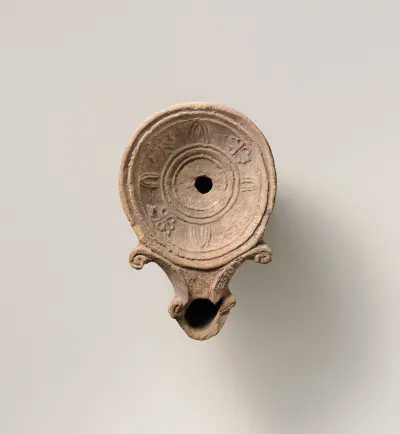 Terracotta oil lamp