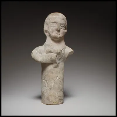 Standing male(?) figurine
