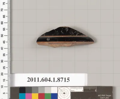 Terracotta fragment of a kylix (drinking cup)