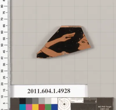 Terracotta rim fragment of a kylix (drinking cup)