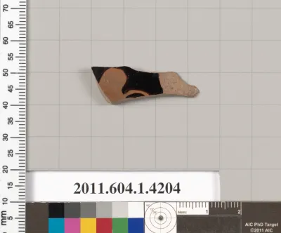 Terracotta fragment of a kylix (drinking cup)