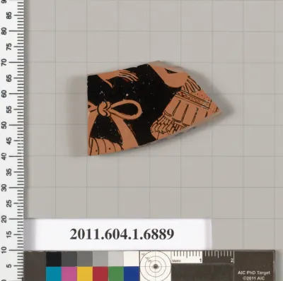 Terracotta fragment of a kylix (drinking cup)