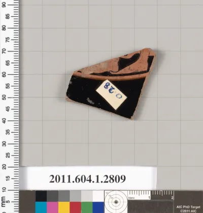 Terracotta fragment of a kylix (drinking cup)