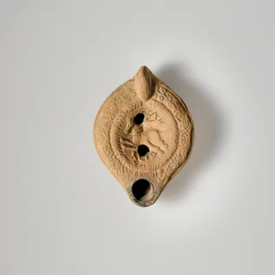 Terracotta oil lamp