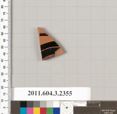 Terracotta fragment of a kylix: eye-cup (drinking cup)