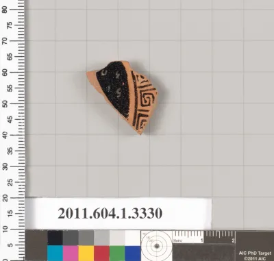 Terracotta fragment of a kylix (drinking cup)